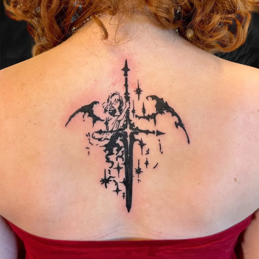 Medium Black and Grey Sword Angel on Women Back Tattoo by @disnerdtattoo