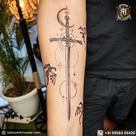 Medium Black and Grey Sword Crescent Moon Dragons on Men Arm Tattoo by @tattooinkmaster27