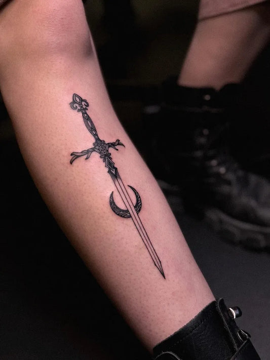 Medium Black and Grey Sword with Crescent Moon on Women Arm Tattoo by @hongma_tt
