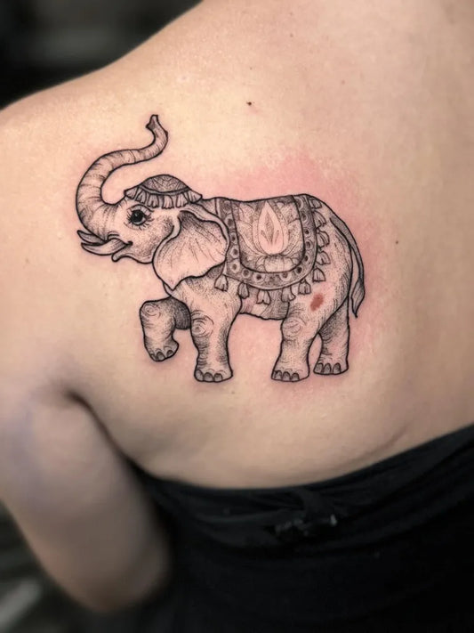 Medium Black and Grey Thai Elephant with Ornamental Howdah Tattoo on Women Shoulder by @baileyavatattoos