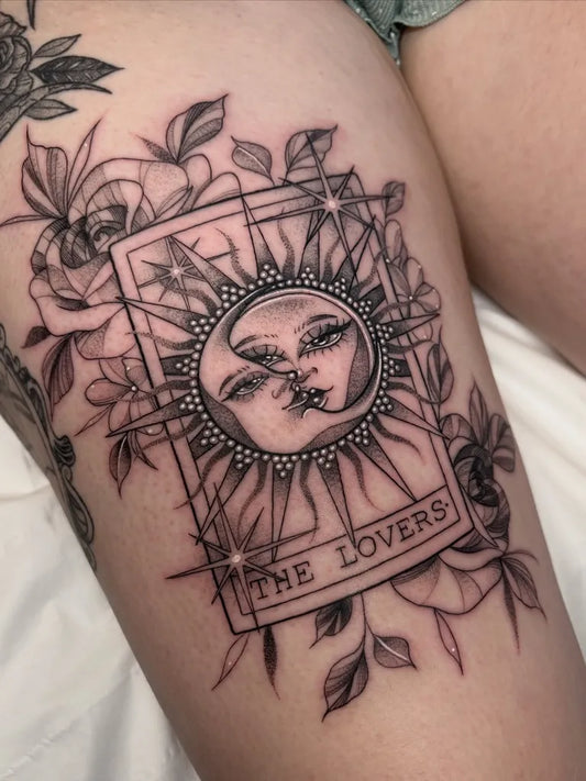 Medium Black and Grey The Lovers Tarot Card with Sun and Roses on Women Thigh Tattoo by @megrobertstattoo