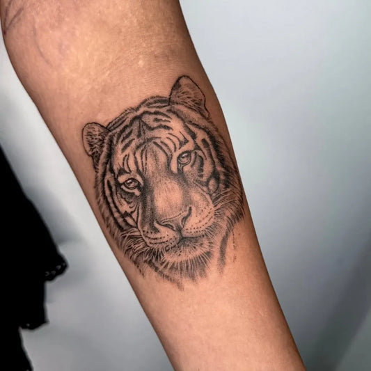Medium Black and Grey Tiger Head Animal Tattoo on Men Arm by @kendahlfaithtattoos