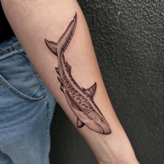 Medium Black and Grey Tiger Shark on Women Arm Tattoo by @lacklane.tattoo