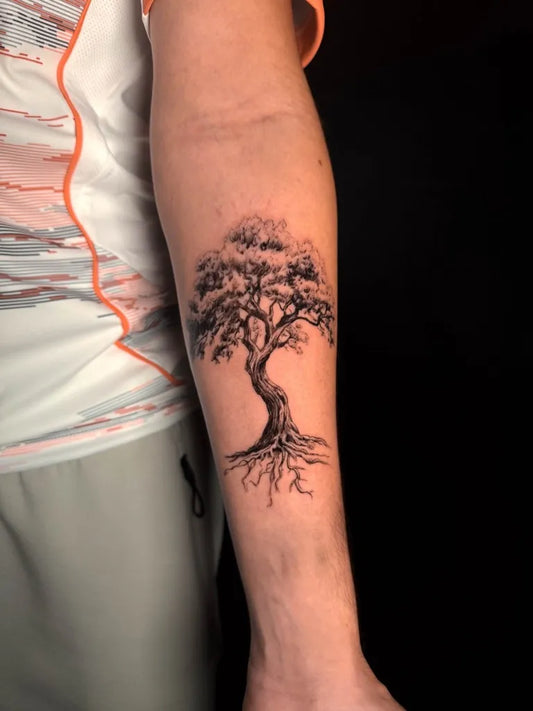 Medium Black and Grey Tree Tattoo on Men Arm by @embassytattoo