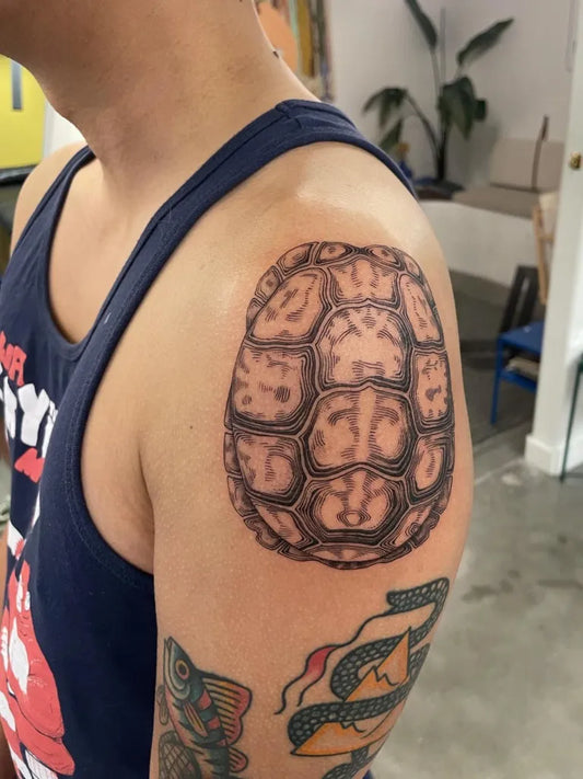 Medium Black and Grey Turtle Shell Tattoo on Men Shoulder by @abaloone