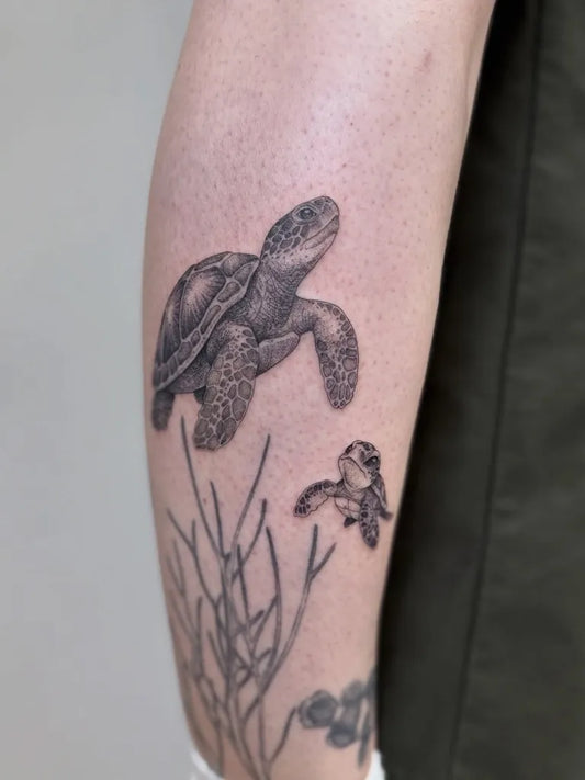 Medium Black and Grey Turtle and Baby Turtle Tattoo on Women Arm by @batxcat.art