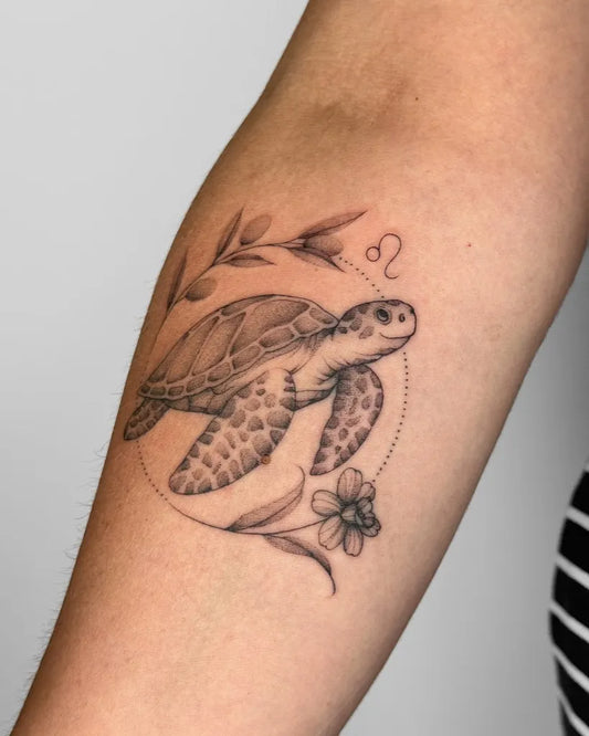 Medium Black and Grey Turtle and Leo Symbol Tattoo on Women Arm by @jessicaalicetattoo