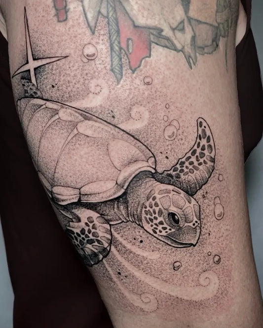 Medium Black and Grey Turtle with Bubbles Tattoo on Women Arm by @coyoteviejo.ink
