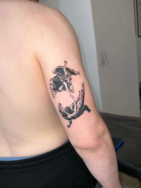 Medium Black and Grey Two Angels on Men Upper Arm Tattoo by @zerokid_tattoo