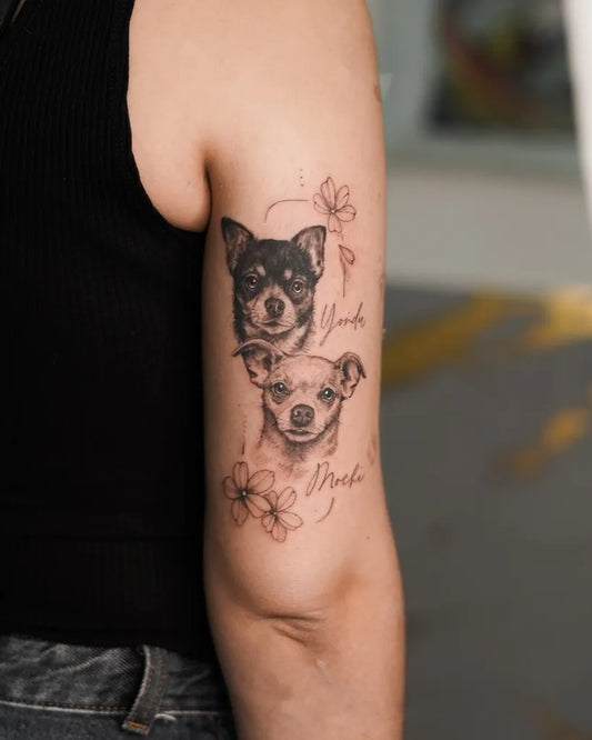 Medium Black and Grey Two Chihuahuas with Flowers Tattoo on Women Arm by @jud.blooms