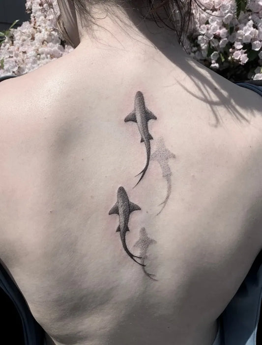 Medium Black and Grey Two Hammerhead Sharks with Shadows on Women Back Tattoo by @romanbutryy