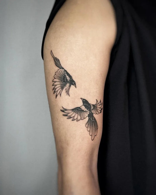 Medium Black and Grey Two Magpie Birds Tattoo on Women Upper Arm by @roughhands_tattoo