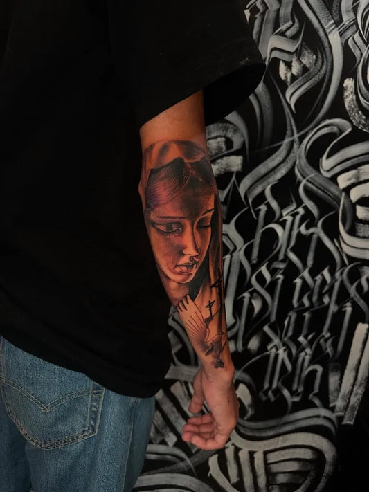 Medium Black and Grey Virgin Mary Portrait Tattoo on Men Arm by @brandoncporter