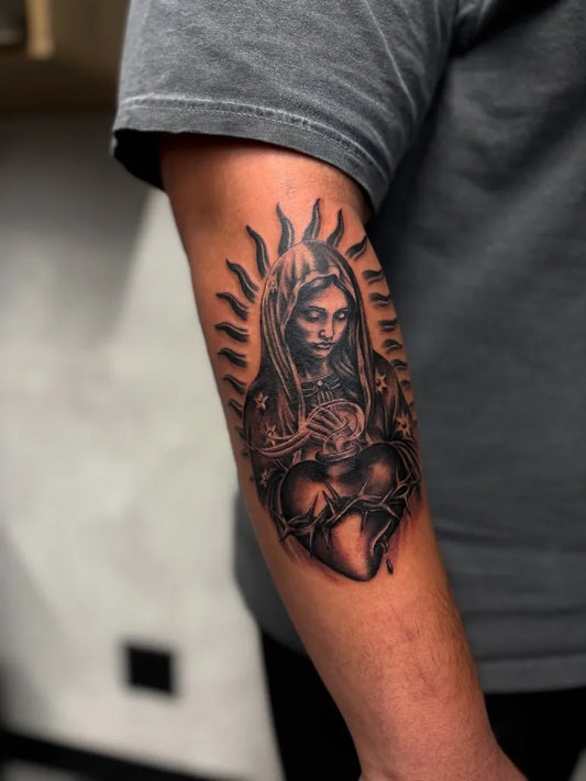 Medium Black and Grey Virgin Mary Sacred Heart Tattoo on Men Arm by @kaythleen.inks