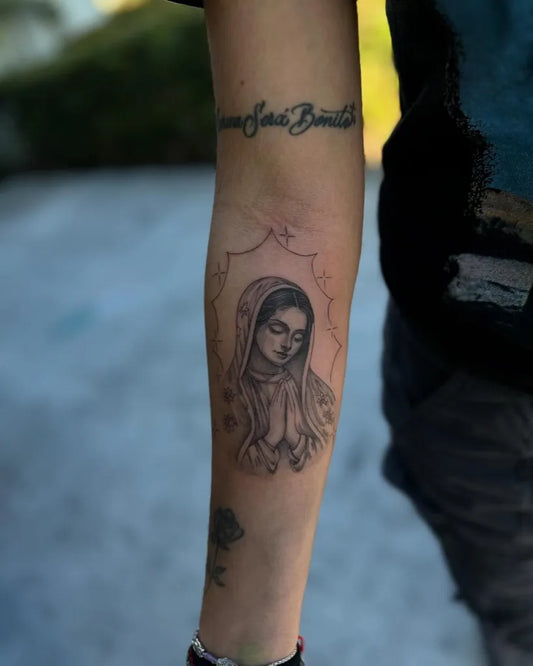 Medium Black and Grey Virgin Mary Script Tattoo on Women Arm by @tatsbyyesi