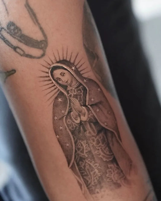 Medium Black and Grey Virgin Mary Tattoo on Women Arm by @sirinate.s