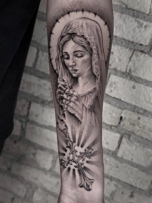 Medium Black and Grey Virgin Mary and Rosary Tattoo on Men Arm by @dennysaurtats