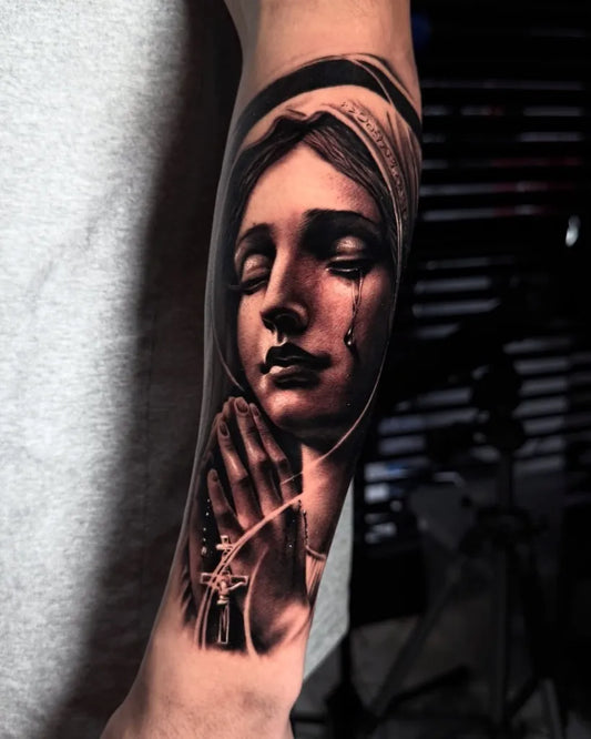 Medium Black and Grey Virgin Mary with Rosary Tattoo on Men Arm by @azerk.tattoos