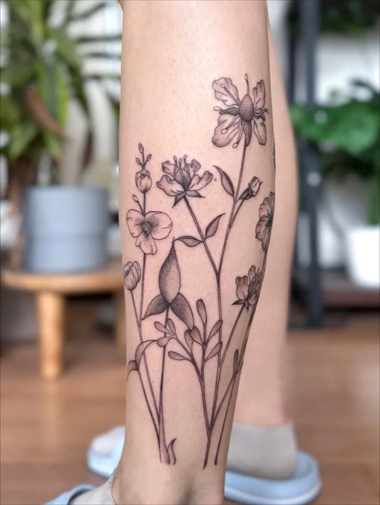Medium Black and Grey Wildflowers Tattoo on Women Calf by @dontsleepvincci
