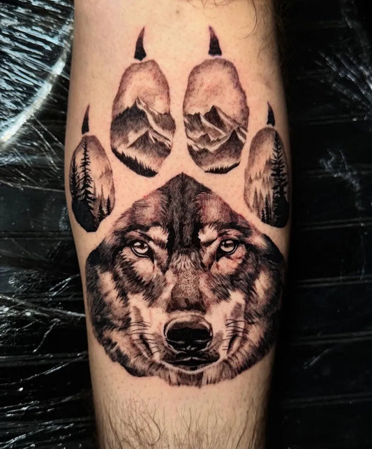 Medium Black and Grey Wolf Paw and Mountains on Men Arm Tattoo by @bronco.tattoo