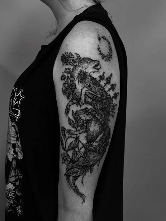 Medium Black and Grey Wolf with Flowers and Moon Nature Tattoo on Women Shoulder by @martafeyles