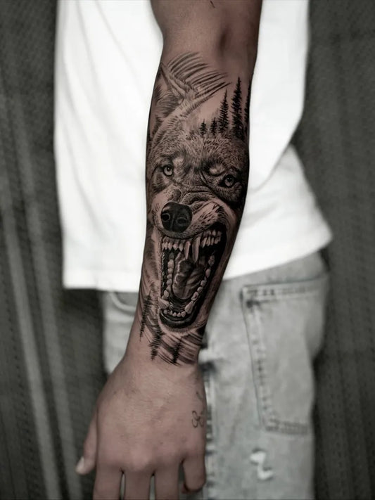 Medium Black and Grey Wolf with Forest on Men Arm Tattoo by @magueltattoo