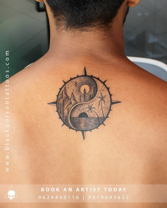Medium Black and Grey Yin Yang Compass Tattoo on Men Back by @blackpoisontattoos