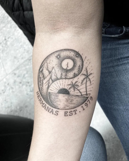 Medium Black and Grey Yin Yang Mountains Palms Tattoo on Women Arm by @catmorfin.tattoo