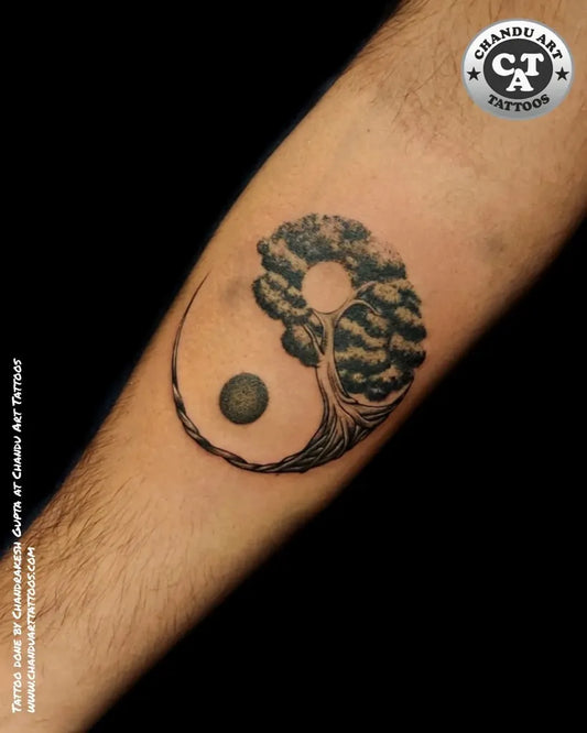Medium Black and Grey Yin Yang Tree Tattoo on Men Arm by @chandu_art_tattoos