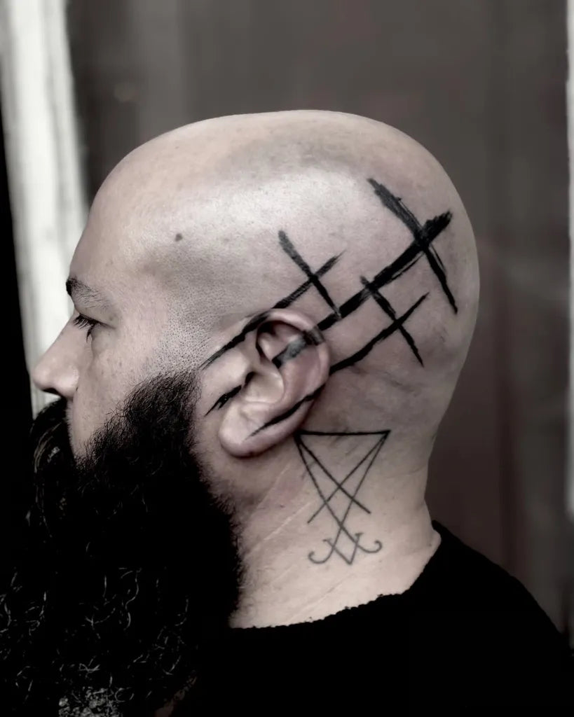 Medium Blackwork 3 Cross and Inverted Pentagram Tattoo on Men Head by @emilianoelchivo