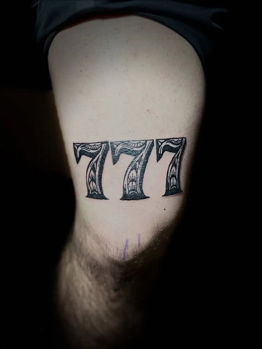 Medium Blackwork 777 Tattoo on Men Thigh by @tattoos_by_zeus