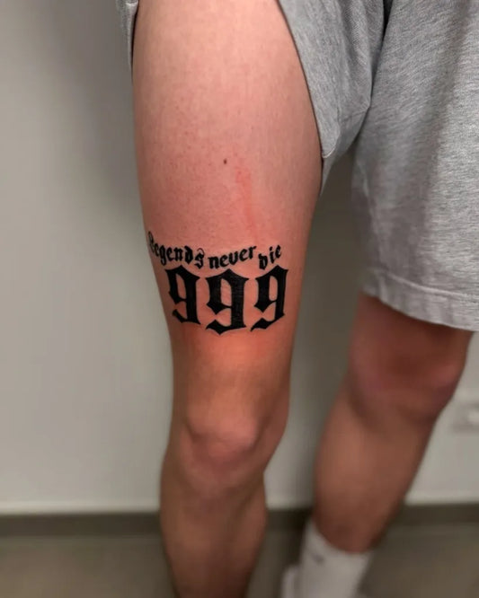 Medium Blackwork 999 lettering Tattoo on Men Thigh by @beeinked_tattoo
