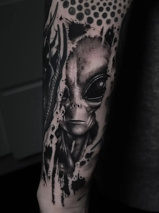 Medium Blackwork Alien Tattoo on Men Arm by @sennajawie_