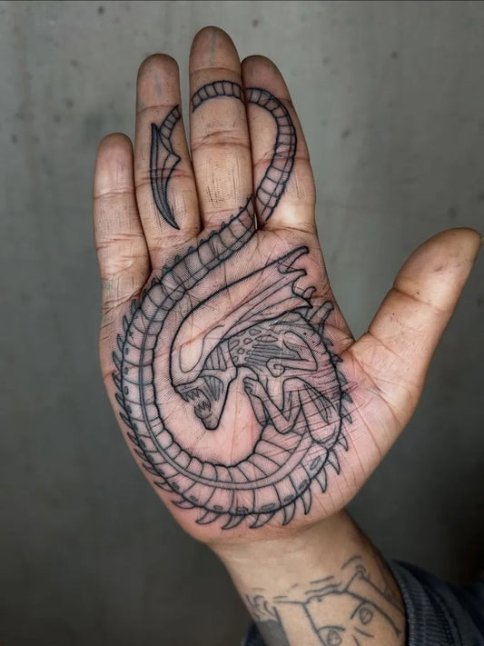 Medium Blackwork Alien Tattoo on Men Hand by @lukeaashley