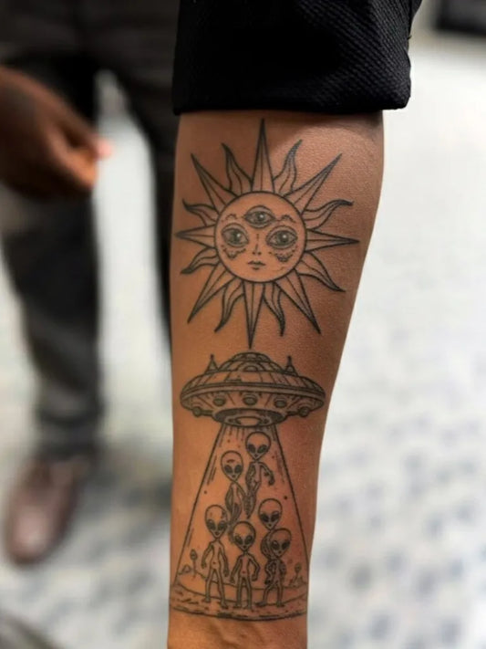 Medium Blackwork Alien UFO Sun Tattoo on Men Forearm by @inkbydj__