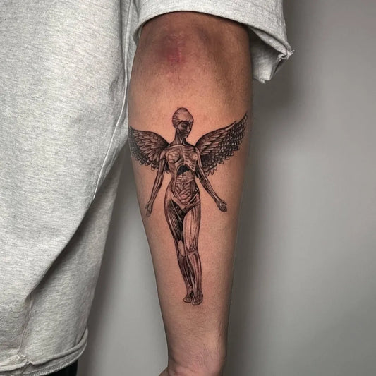 Medium Blackwork Anatomical Angel on Men Arm Tattoo by @a_gak._