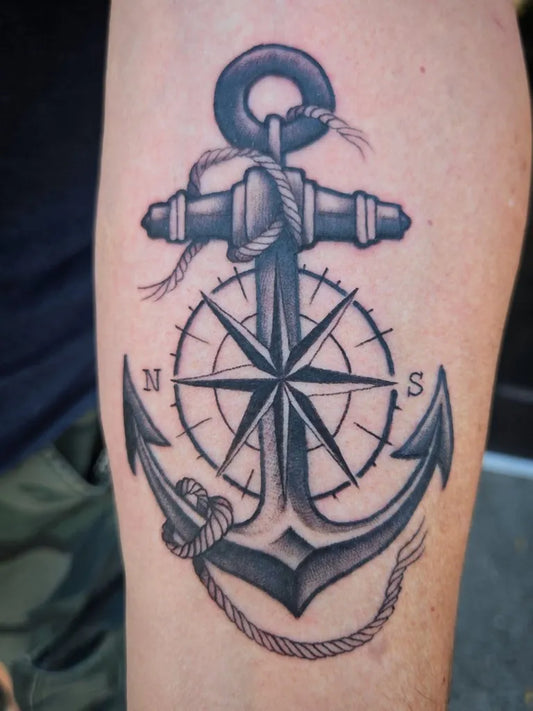 Medium Blackwork Anchor and Compass Tattoo on Men Arm by @goodbread_tattoos