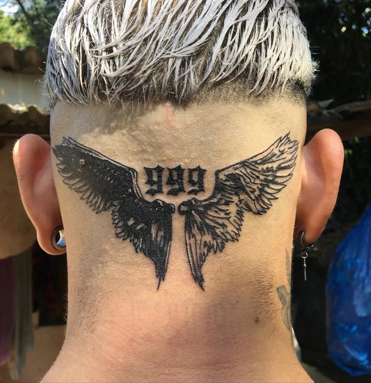 Medium Blackwork Angel Wings and 999 Tattoo on Men Head by @smille_tattoo
