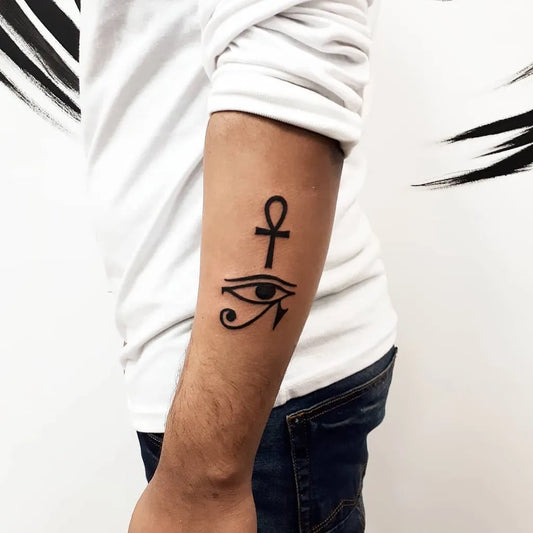 Medium Blackwork Ankh Eye on Men Arm Tattoo by @kaylin.andersen.art