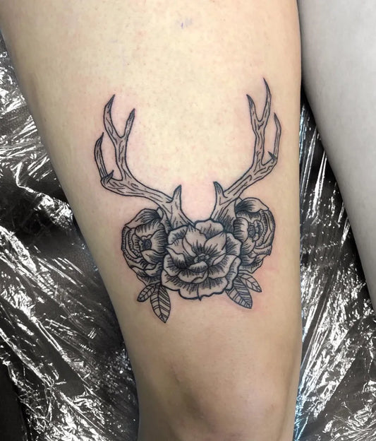 Medium Blackwork Antlers and Peonies on Women on Thigh Tattoo by @laurenbrice_tattoos