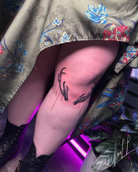 Medium Blackwork Antlers on Women Knee Tattoo by @inkedbyannyy