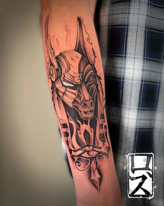 Medium Blackwork Anubis Mask Tattoo on Men Arm by @roz.tattooist