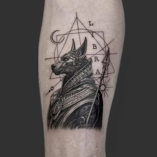 Medium Blackwork Anubis and Geometric Symbols Tattoo on Men Arm by @__noone__ink
