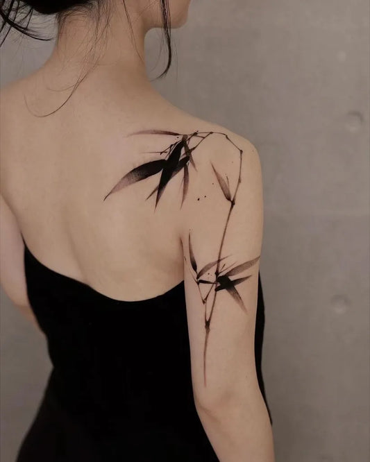 Medium Blackwork Bamboo Tattoo on Women Shoulder by @newtattoo_st
