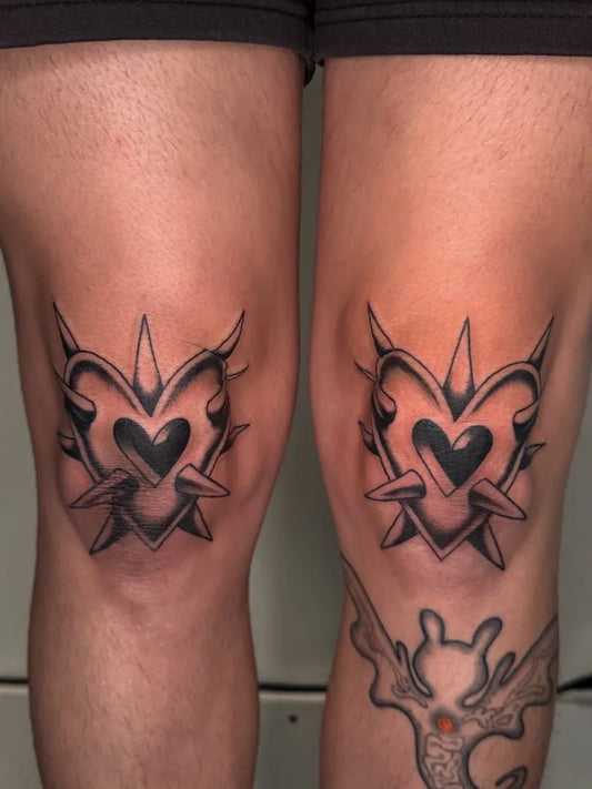 Medium Blackwork Barbed Heart Tattoo on Men Knee by @ga.tattoos