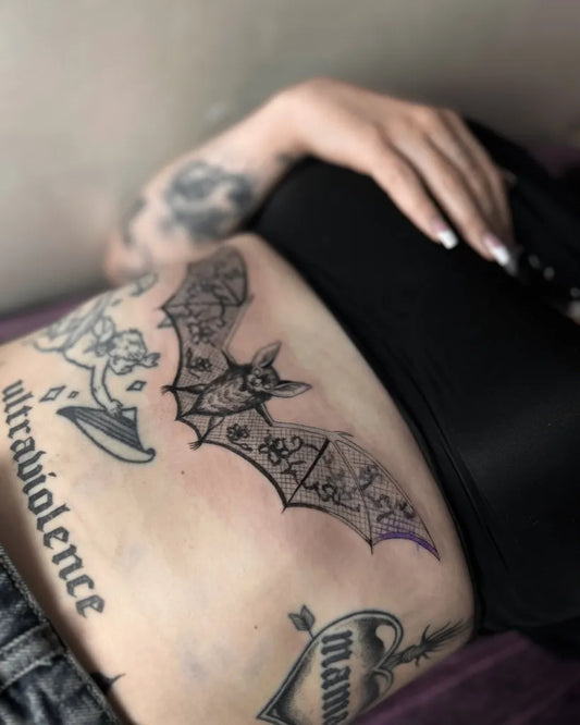 Medium Blackwork Bat Mushroom Tattoo on Women Torso by @melty.pokes