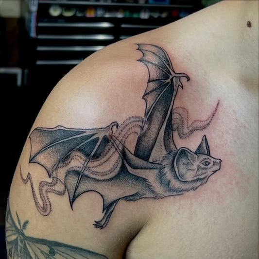 Medium Blackwork Bat with Serpent Men Shoulder by @schenpen_tattoo