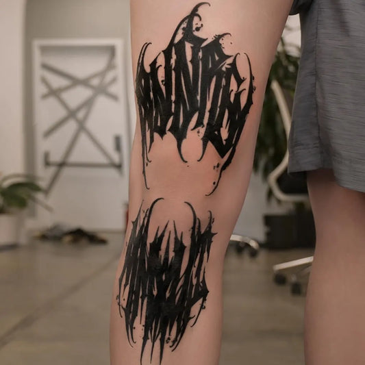 Medium Blackwork Blackletter Tattoo on Women Knee by @gary.tattooer