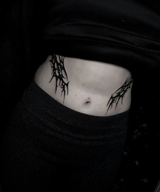 Medium Blackwork Branched Vines Tattoo on Women Stomach by @tarastattoos