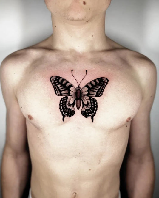Blackwork Butterfly on Men Chest Tattoo by @inkairtattoo